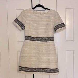Cream dress with a little sparkle and a fun pattern detail!